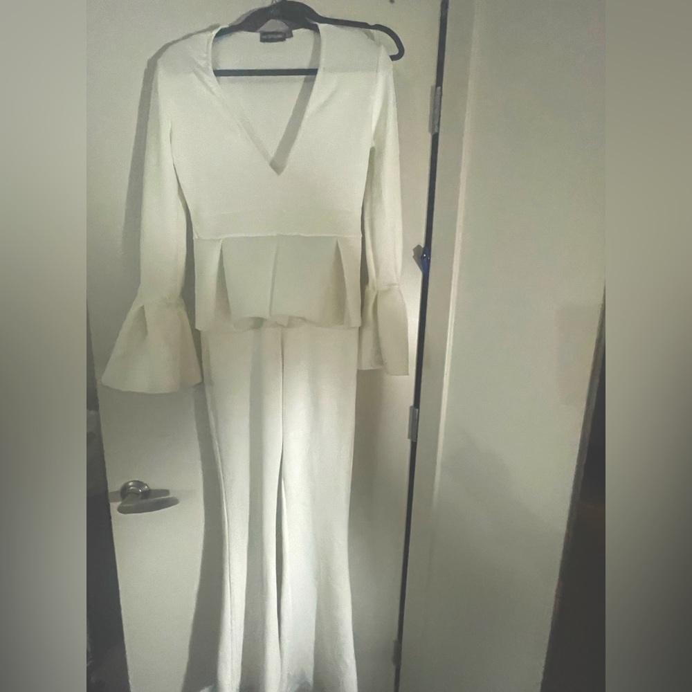 White one piece jumpsuit. very stretchy material